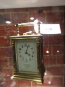 A FRENCH STRIKE / REPEAT CARRIAGE CLOCK RETAILED BY PENLINGTON & BATTY. THE CASE WITH FLUTED COLUMNS