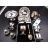 A PAIR OF VICTORIAN SILVER PIERCED WORK BON BON DISHES AND A CHRISTENING CUP, A CASED EGG CUP AND