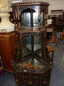 A FLOOR STANDING CORNER CABINET WITH HAND PAINTED INDIAN SCENE DECORATION. W.83 x H.173cms.