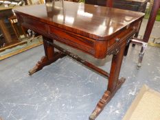 A 19th.C.ROSEWOOD SMALL LIBRARY TABLE WITH TWO END DRAWERS ON TRESTLE END SUPPORTS AND FOLIATE