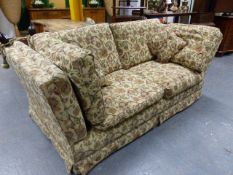 A KNOWLE THREE CUSHION DRAWING ROOM SETTEE.