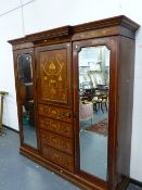 AN EDWARDIAN MAHOGANY AND INLAID ART NOUVEAU BREAKFRONT COMPACTUM WARDROBE, TWO MIRRORED DOOR