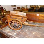 A GROUP OF FOUR SCRATCH BUILT MODEL WAGONS TO INCLUDE A COVERED WAGON.