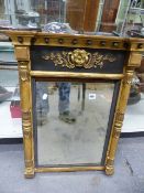 A 19th.C.GILT FRAMED PIER MIRROR WITH PLAIN PLATE FLANKED BY MOULDED PILLARS AND LATER EBONISED