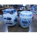 A CHINESE BLUE AND WHITE BARREL FROM GARDEN SEAT WITH SCROLLING FOLIATE AND FLOWER HEAD