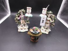 A PAIR OF CONTINENTAL FIGURAL CANDLESTICKS TOGETHER WITH A FRENCH PORCELAIN INKWELL, THE FORMER WITH