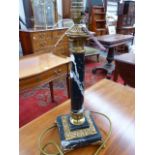 A MARBLE AND GILT METAL MOUNTED COLUMN FORM TABLE LAMP. OVERALL H.43cms.