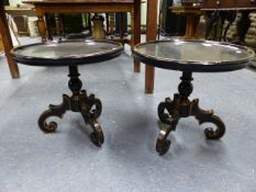 A PAIR OF GILT DECORATED EBONISED REGENCY STYLE CIRCULAR LAMP TABLES. Dia.51 x H.48cms.