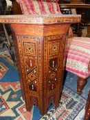 AN OCTAGONAL MOORISH STAND / TABLE WITH EXTENSIVE INLAID DECORATION TOGETHER WITH AN INDIAN HARDWOOD