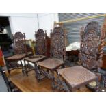 A SET OF EIGHT VICTORIAN CARVED OAK DINING CHAIRS WITH CANED BACK PANELS AND SEATS. TOGETHER WITH