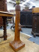 ROBERT THOMPSON, MOUSEMAN. A PAIR OF TAPERED TABLE LAMPS WITH OCTAGONAL STEP AND LEAF CARVED