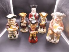 SIX VARIOUS POTTERY TOBY JUGS, THE TALLEST, A THIN MAN JUG. H.28cms. ONLY THE SNUFF TAKER JUG,