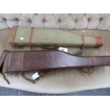 A PIGSKIN LEATHER LEG O' MUTTON GUN CASE TOGETHER WITH A CANVAS EXAMPLE. (2)