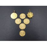 A 1793 GEO.IV FIXED PENDANT SPADE GUINEA TOGETHER WITH FOUR FULL SOVEREIGNS DATED 1898,1900,1905,