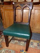 A 19th.C.PUGINESQUE GOTHIC DESIGN SIDE CHAIR WITH CARVED CREST RAIL.