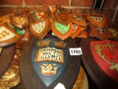 A COLLECTION OF OXFORD UNIVERSITY HAND PAINTED COLLEGE ARMS ON OAK SHIELDS, VARIOUS SIZES. 9-19cms.