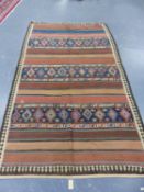 AN ANTIQUE TRIBAL KELIM RUG. 305 x 178cms.