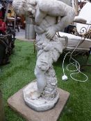 A COMPOSITE STONE FIGURE OF ATLAS SUPPORTING THE WORLD. H.90cms.