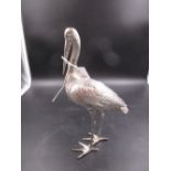 A GERMAN SILVER MODEL OF A STORK WITH ENGLISH IMPORT MARKS FOR CHESTER, DATED 1908 FOR BERTHOLD