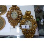 A PAIR OF ITALIAN CARVED GILTWOOD ROCOCO STYLE OVAL MINIATURE FRAMES. H.29cms. TOGETHER WITH TWO