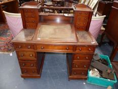 A WALNUT VICTORIAN TWIN PEDESTAL DICKENS DESK, SPINDLE GALLERY WITH FLANKING BANKS OF SIDE LOCKING