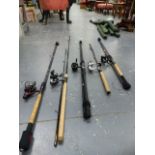 A QTY OF FISHING RODS TO INCLUDE KA MASAN FITTED WITH OKUMA REEL, SHAKESPEARE AGILITY 14", RON