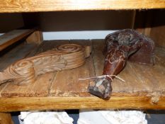 A PAIR OF PLASTER BRACKETS WITH MASK DECORATION TOGETHER WITH A CARVED PINE CORBEL AND A FIGURAL OAK