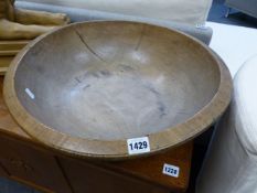 A LARGE ANTIQUE SYCAMORE TURNED DEEP BOWL. Dia.49cms.