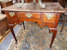 A GEO.III. OAK COUNTRY LOWBOY SIDE TABLE WITH THREE FRIEZE DRAWERS, ON SHAPED SQUARE SECTION LEGS