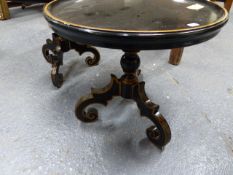 A PAIR OF GILT DECORATED EBONISED REGENCY STYLE CIRCULAR LAMP TABLES. Dia.51 x H.48cms.