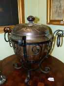 A 19th.C.WROUGHT IRON AND COPPER ARTS AND CRAFTS COAL BUCKET WITH EMBOSSED DECORATION TO THE TOP.