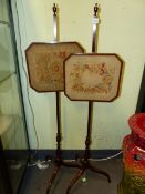 A PAIR OF 19th.C.MAHOGANY POLE SCREENS WITH NEEDLEWORK PANELS.