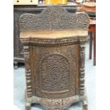 A 19th.C.CARVED BURMESE TEAK SMALL BOW FRONT SIDE CABINET WITH SINGLE FRIEZE FOLIATE PIERCED DOOR