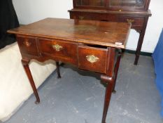 A GEO.III.OAK LOWBOY WITH THREE FRIEZE DRAWERS ON SLENDER TURNED LEGS AND PAD FEET. W.80 x H.73cms.