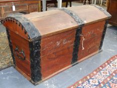 A 19th.C.IRON BOUND PINE DOME TOP BLANKET CHEST WITH SIDE CARRYING HANDLES AND ORIGINAL LOCK AND