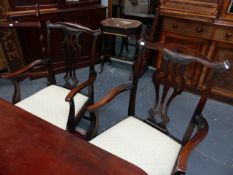 A SET OF EIGHT LATE GEORGIAN STYLE DINING CHAIRS WITH PIERCED SPLAT BACKS TOGETHER WITH THREE