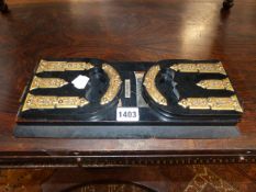 A 19th.C.MAHOGANY BED TRAY TOGETHER WITH A VICTORIAN EBONISED AND GILT METAL MOUNTED BOOKCASE. (2)