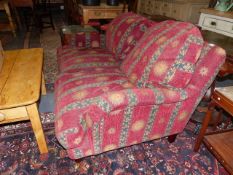 A PAIR OF HOWARD STYLE DEEP SEAT SMALL SETTEES WITH SCROLL ARMS. (2)