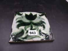 A WILLIAM DE MORGAN MERTON ABBEY GLAZED POTTERY TILE. 15.5 x 15.5cms.