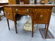 AN INLAID MAHOGANY GEO.III BOW FRONT SIDEBOARD WITH A CENTRAL SHALLOW DRAWER FLANKED BY TWO DEEP