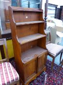 A 19th.C.AND LATER SATINWOOD SMALL WATERFALL BOOKCASE WITH CUPBOARDS BELOW. 63 x 31 x H.137cms.