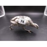 A WHITE METAL FIGURE OF A GROUSE, REALISTICALLY MODELLED WITH INTRICATELY CHASED FEATHERS. LENGTH
