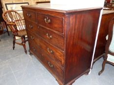 AN EARLY 19th.C.MAHOGANY CHEST OF TWO SHORT AND THREE LONG GRADUATED DRAWERS STANDING ON OGEE