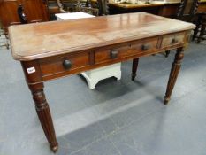 AN EARLY VICTORIAN COLONIAL HARDWOOD WRITING TABLE IN THE MANNER OF GILLOWS WITH THREE FRIEZE