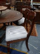 A SET OF FOUR Wm.IV. CARVED ROSEWOOD DINING CHAIRS ON TURNED AND REEDED LEGS. (4)