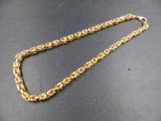 A 9ct GOLD KINGS LINK NECKLACE, LENGTH 40cms, WEIGHT 27.4grms.