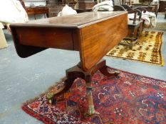 AN EARLY 19th.C.MAHOGANY PEDESTAL PEMBROKE LIBRARY TABLE WITH END DRAWER AND QUADRUPED LEGS FITTED