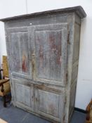 A LARGE 19th.C.FRENCH PROVINCIAL FOUR DOOR HALL CABINET WITH PANEL DOORS AND SIDES ENCLOSING