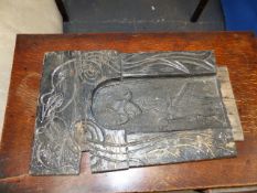 AN 18th.C.CARVED OAK PANEL IN SURROUND. 71 x 34cms.