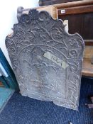 A CAST IRON FIREBACK DECORATED WITH A MAIDEN AND TREE. H.85 x 60cms.